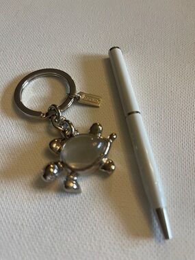 Coach Silver Turtle Keychain with an Inset and Coach Pen